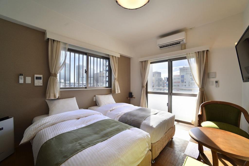 Aparthotel Cosmos Omoromachi Station à Naha Extérieur photo