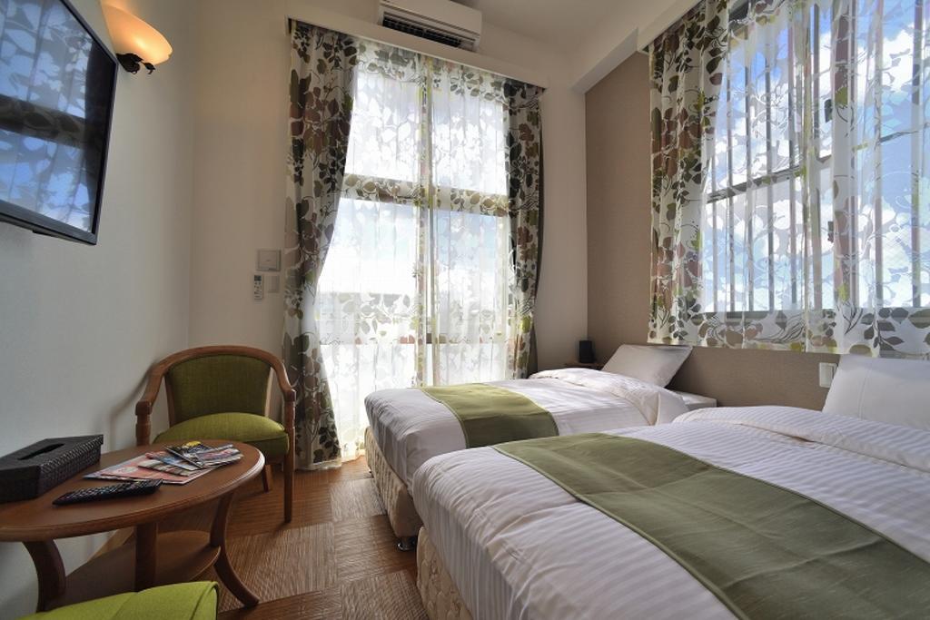 Aparthotel Cosmos Omoromachi Station à Naha Extérieur photo